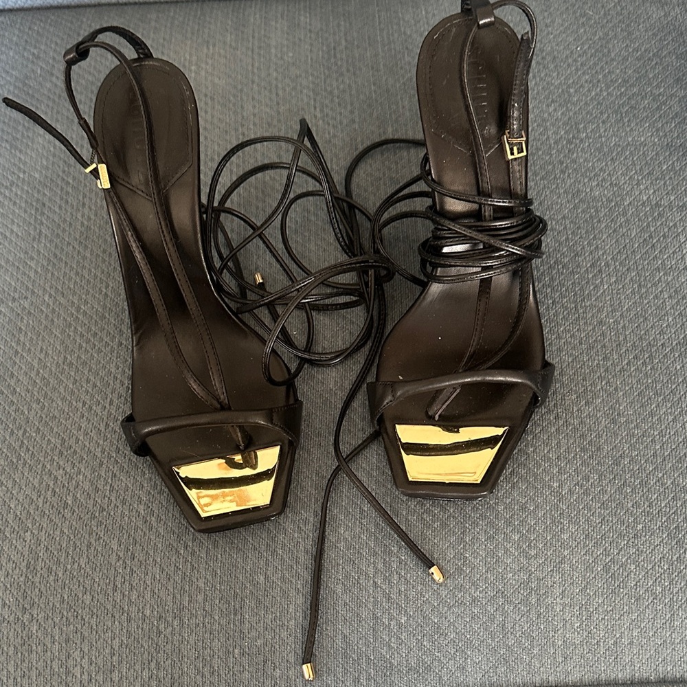 SCHUTZ Black and Gold Strappy Heels